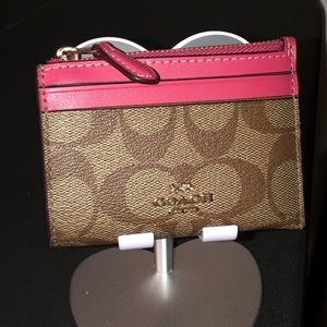 Coach Mini Skinny if case in signature canvas